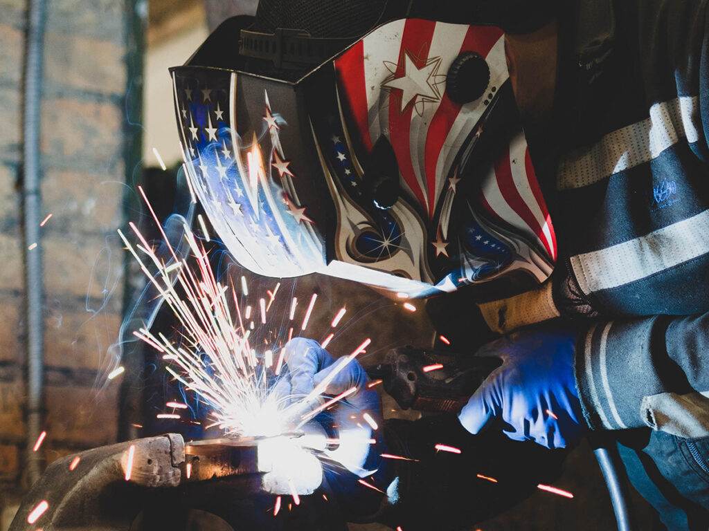1200x900GMB-1 Person in a welding helmet