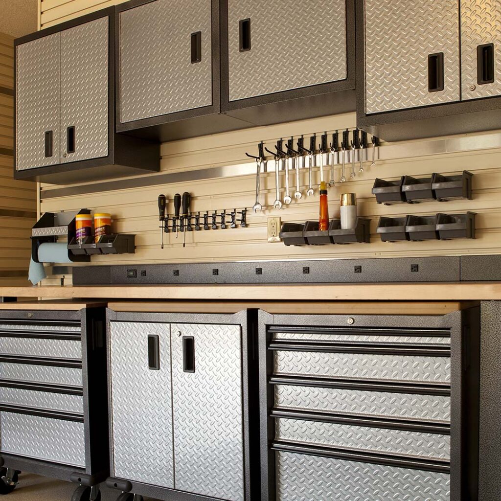 Garage workspace with cabinets, countertop and tools