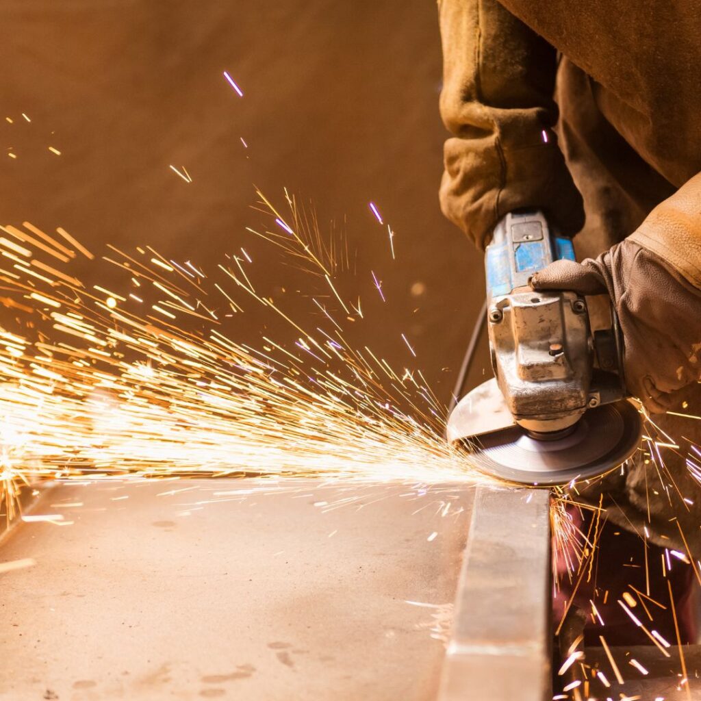 welding equipment creating sparks on metal project