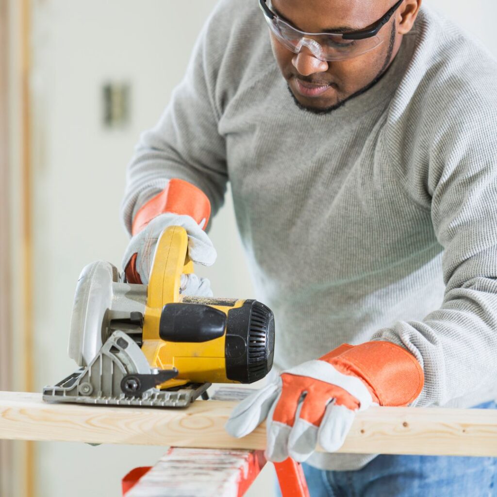 man using a power tool