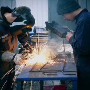 people welding
