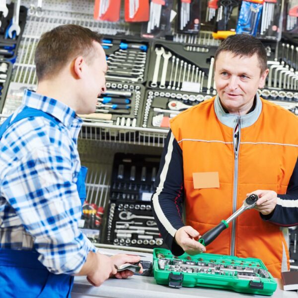 Hardware store employee and customer