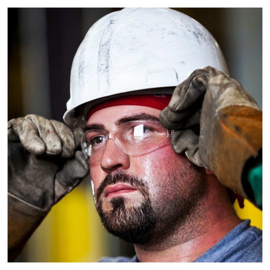 construction worker with hard hat and safety glasses