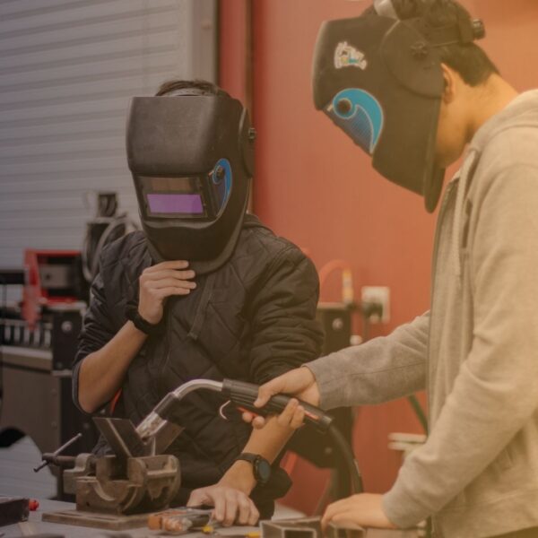 welders checking equipment