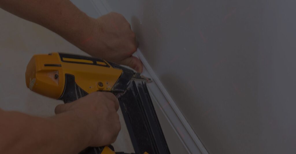 attaching trim with power tool